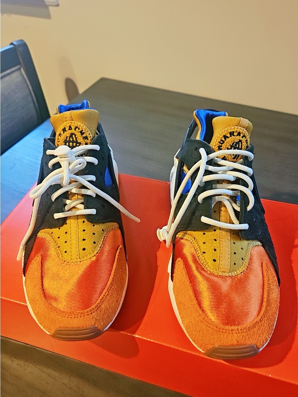 Nike Kids Sneakers in Orange, Yellow, Black & Blue